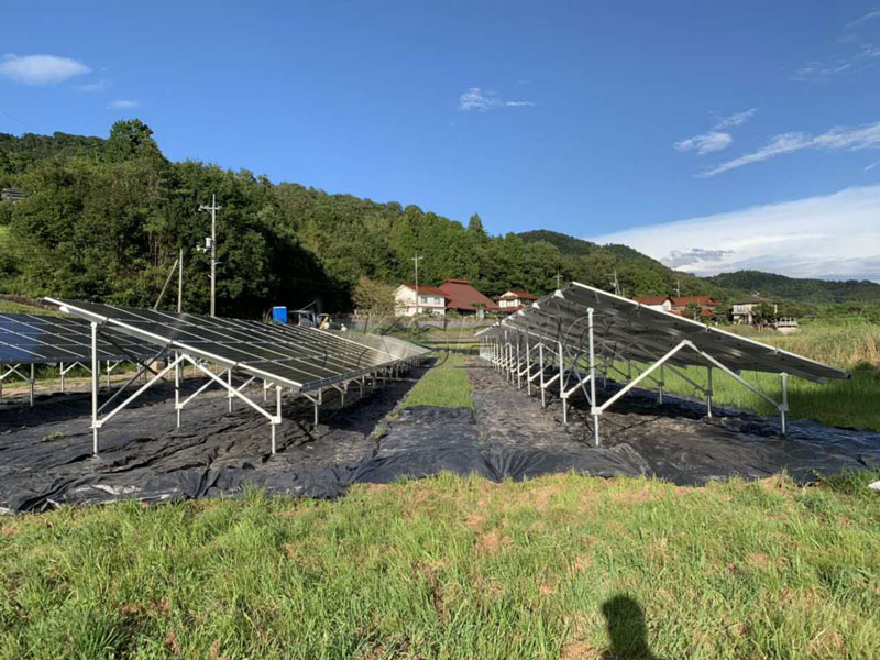 Solar panels installed with optimized row spacing and airflow Solar-farm-mounting-structure-and-optimized-solar-array-layout