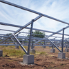 Commercial solar farm ZAM ground rack concrete foundation field installation